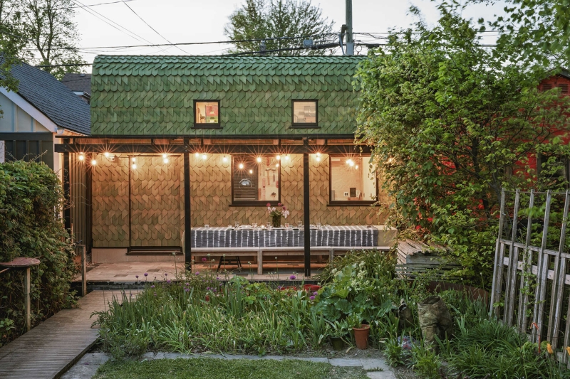 Dragon-Inspired Wood Shingles Cover This Laneway Garage