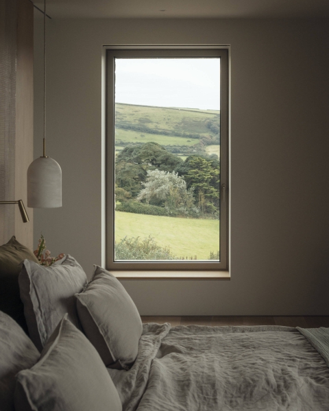 Inside A Stone House That Follows the Land
