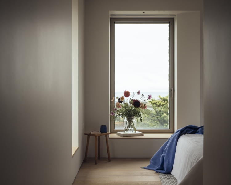 Inside A Stone House That Follows the Land