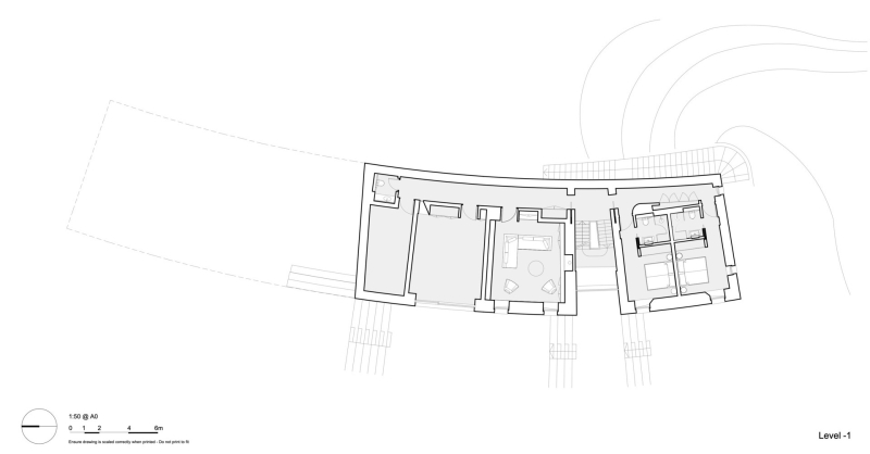 Inside A Stone House That Follows the Land