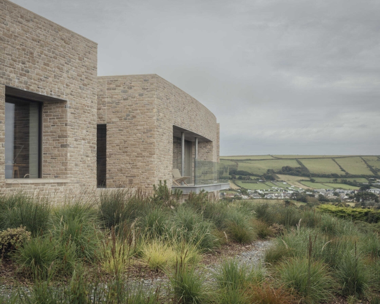 Inside A Stone House That Follows the Land