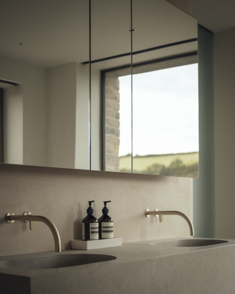 Inside A Stone House That Follows the Land