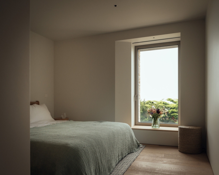 Inside A Stone House That Follows the Land