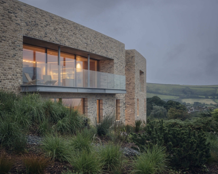 Inside A Stone House That Follows the Land