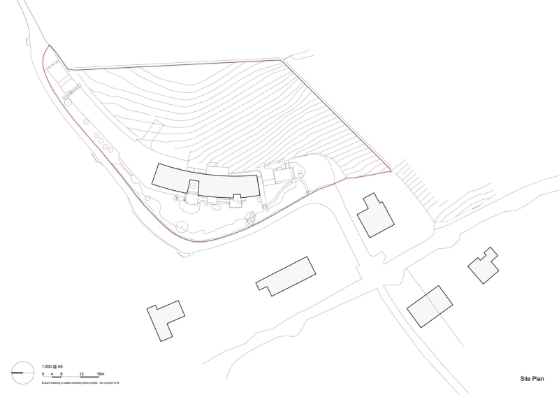 Inside A Stone House That Follows the Land