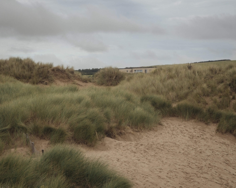 Inside A Stone House That Follows the Land