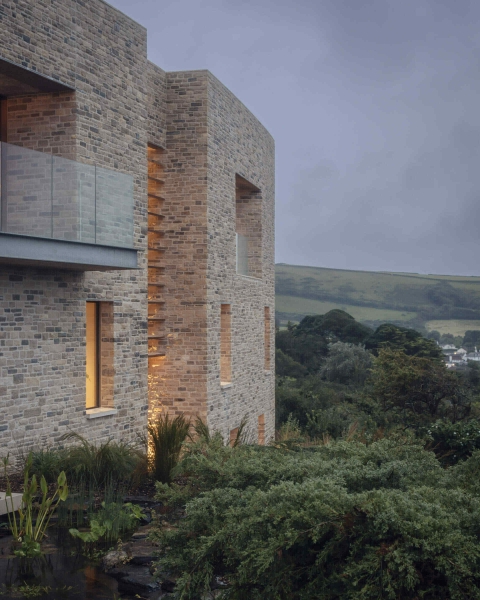 Inside A Stone House That Follows the Land