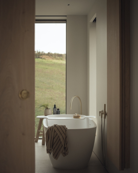 Inside A Stone House That Follows the Land