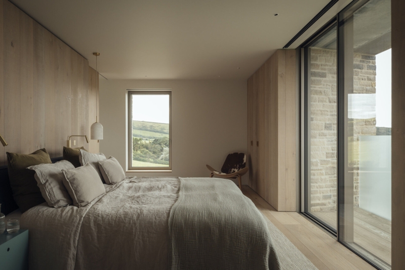 Inside A Stone House That Follows the Land