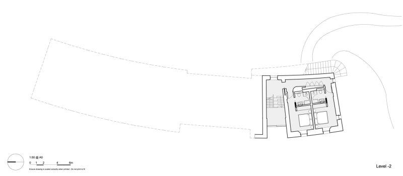 Inside A Stone House That Follows the Land