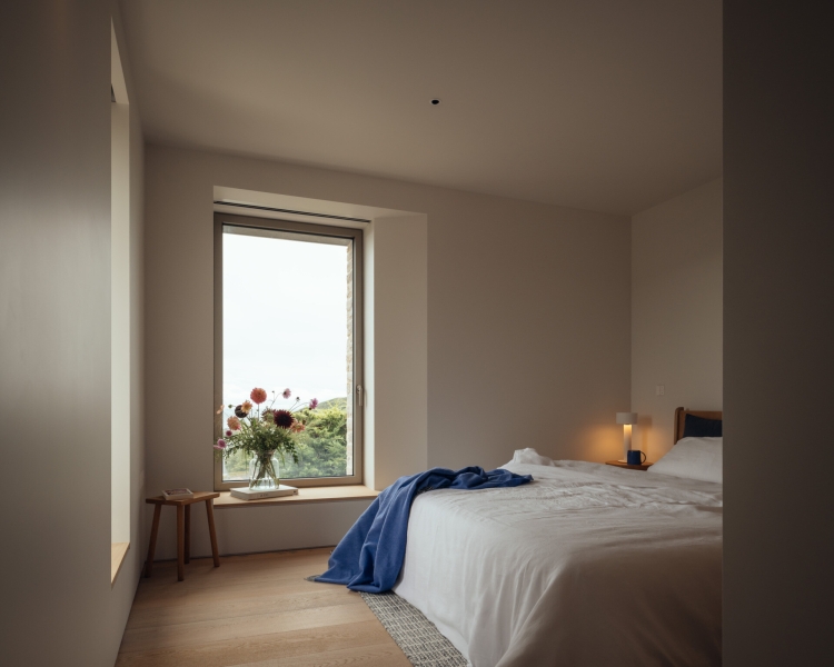 Inside A Stone House That Follows the Land