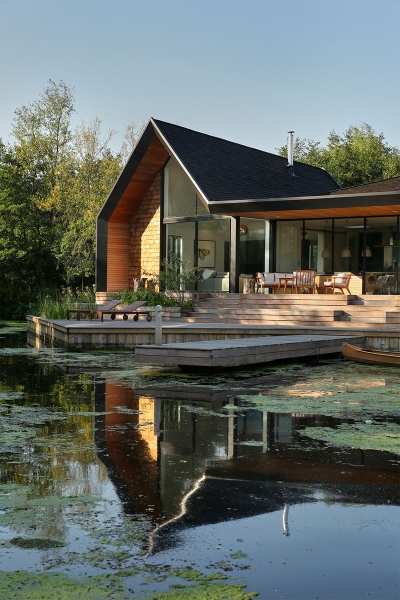 Inspired by Boat Sheds and Covered in Wood Shingles, This House Feels Surprisingly Modern