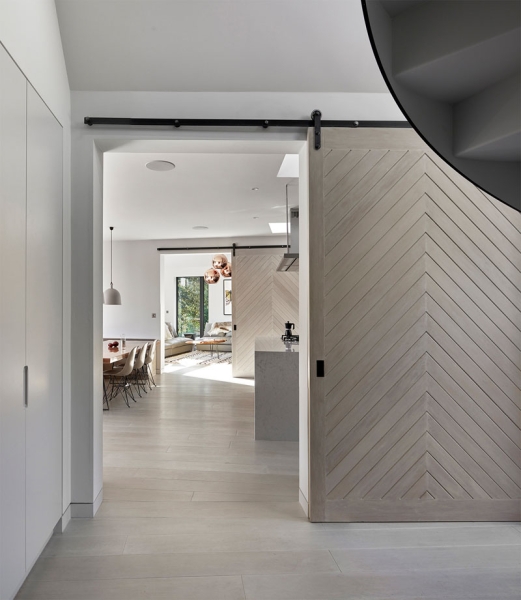 Inspired by Boat Sheds and Covered in Wood Shingles, This House Feels Surprisingly Modern