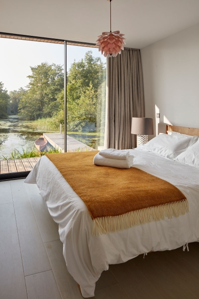 Inspired by Boat Sheds and Covered in Wood Shingles, This House Feels Surprisingly Modern