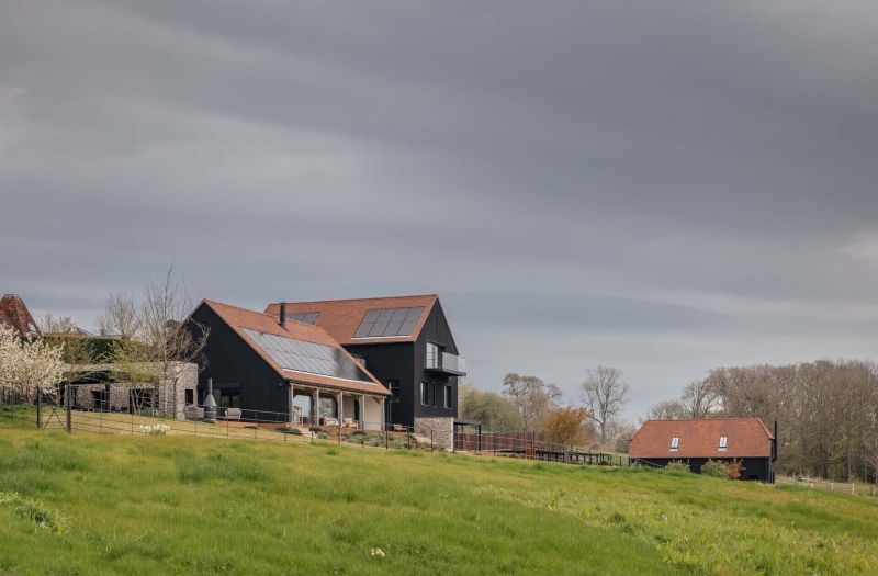Prefabricated Timber Frames Bring This Barn-Inspired Home to Life