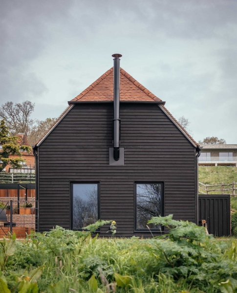 Prefabricated Timber Frames Bring This Barn-Inspired Home to Life