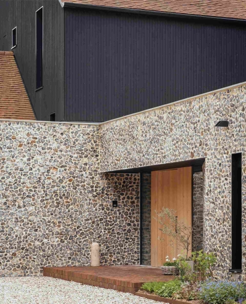 Prefabricated Timber Frames Bring This Barn-Inspired Home to Life