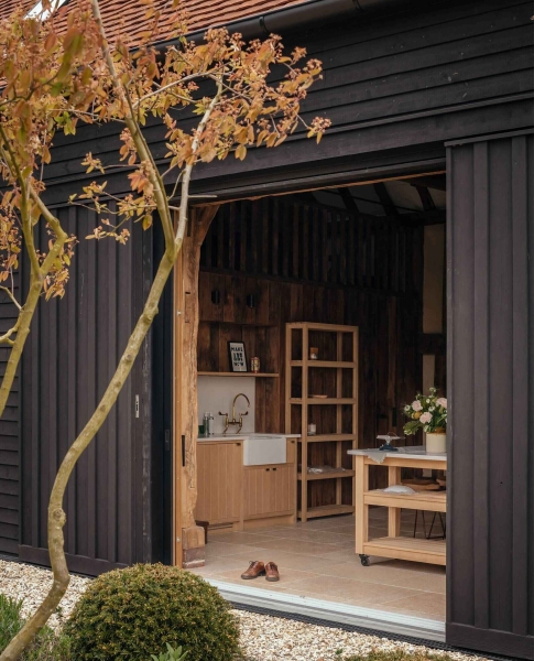 Prefabricated Timber Frames Bring This Barn-Inspired Home to Life