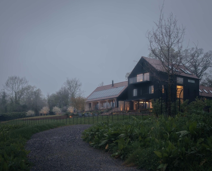 Prefabricated Timber Frames Bring This Barn-Inspired Home to Life