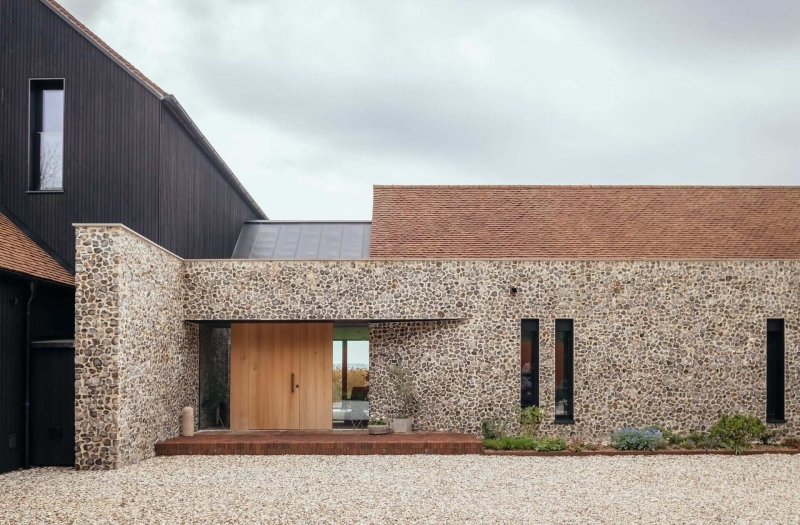 Prefabricated Timber Frames Bring This Barn-Inspired Home to Life