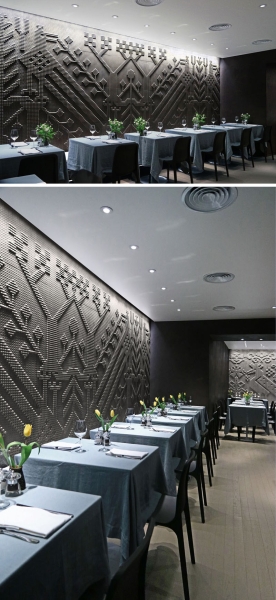 The Story Behind Olivo’s Striking Stone Tapestry Walls