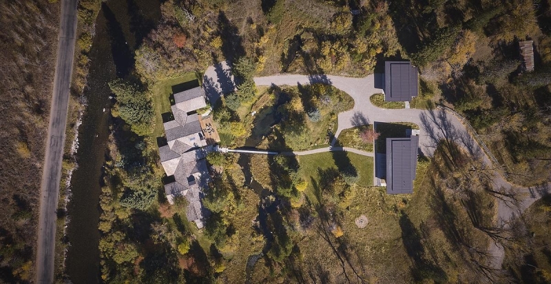 They added a guest house that begins with a short walk over a bridge