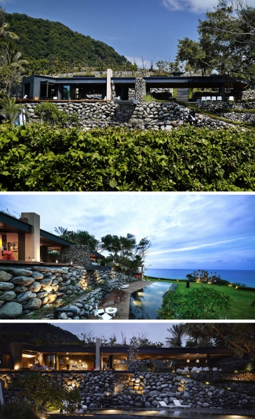 This modern stone house looks like it grew from the earth itself