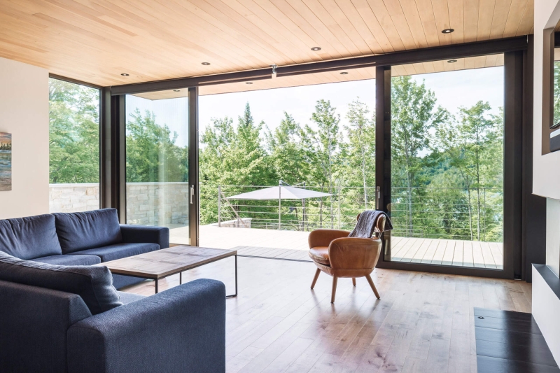 This Terraced House Reuses Excavated Stone for the Landscape
