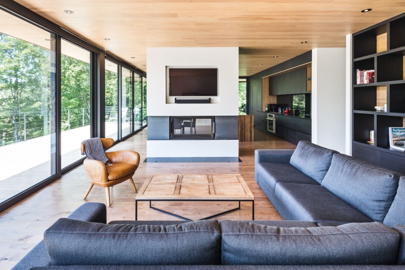 This Terraced House Reuses Excavated Stone for the Landscape