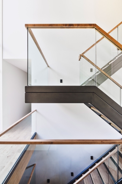 This Terraced House Reuses Excavated Stone for the Landscape