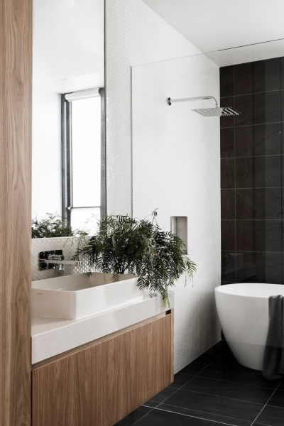 A Dark Brick Exterior Hides A Light-Filled Courtyard Inside This Home