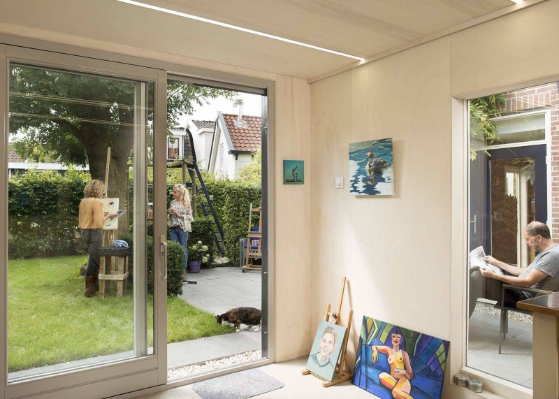 An Old Backyard Shed Becomes a Bright Art Studio