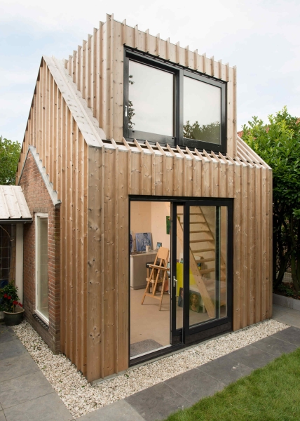 An Old Backyard Shed Becomes a Bright Art Studio