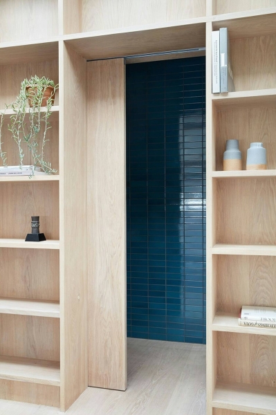 How a Small Carriage House Became a Serene Creative Space With A Reading Nook