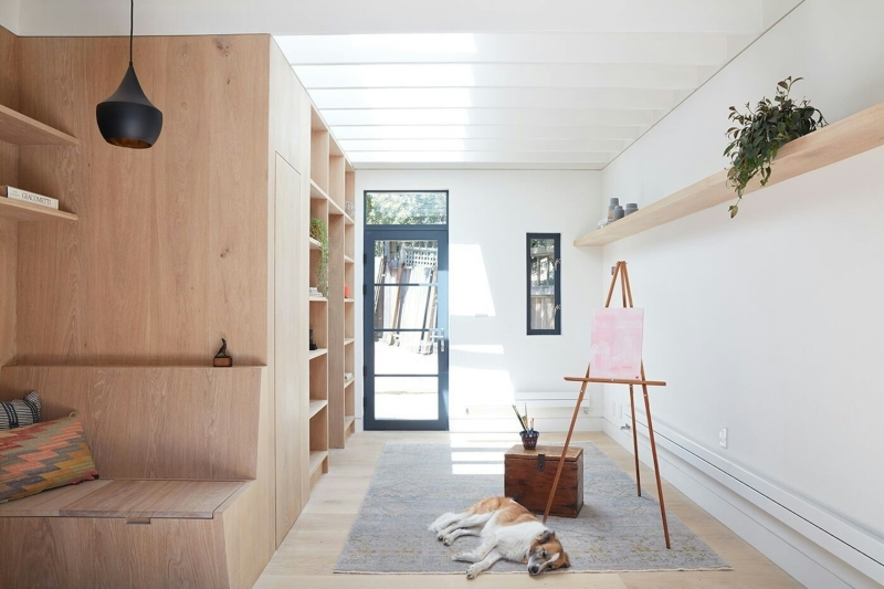 How a Small Carriage House Became a Serene Creative Space With A Reading Nook