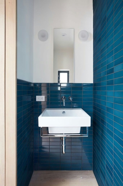 How a Small Carriage House Became a Serene Creative Space With A Reading Nook