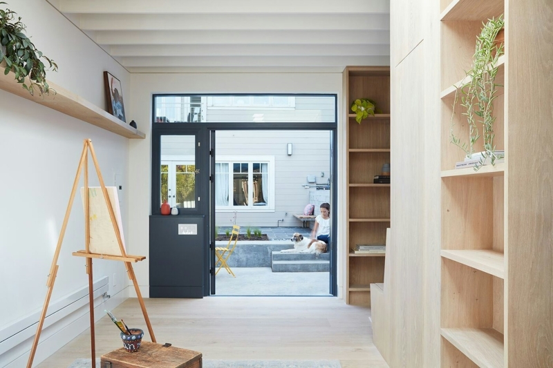 How a Small Carriage House Became a Serene Creative Space With A Reading Nook