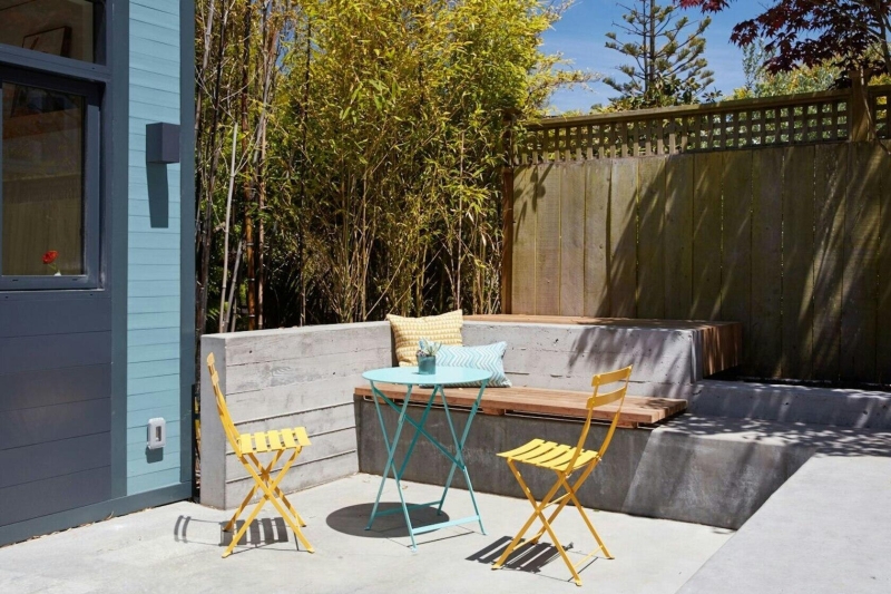 How a Small Carriage House Became a Serene Creative Space With A Reading Nook