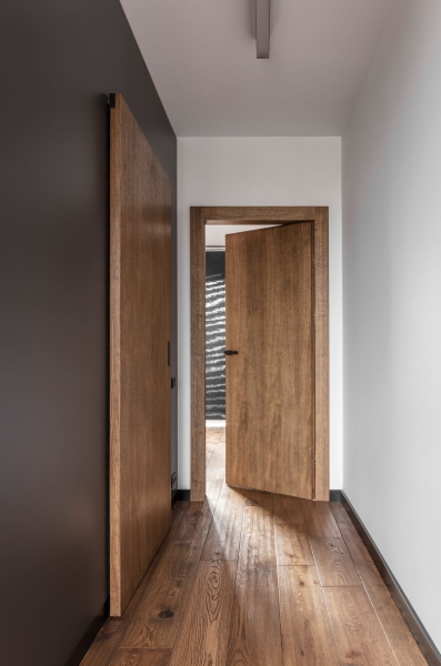 Industrial Materials Meet Warm Wood Inside This Thoughtful Apartment