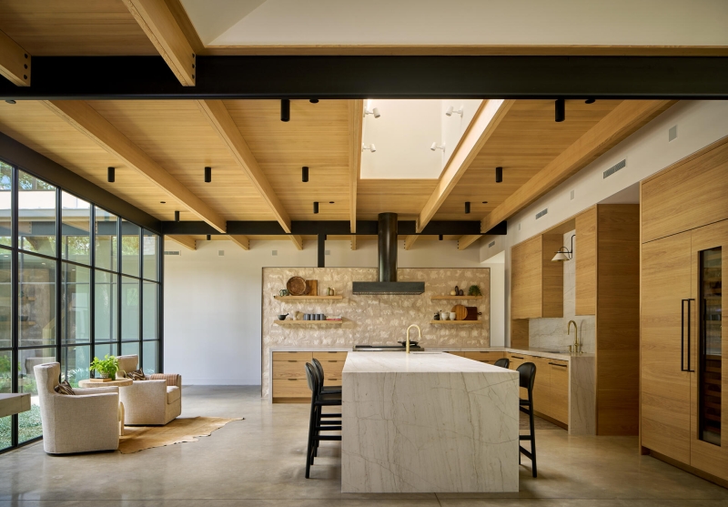 Inside A Home Where Limestone, Wood, and Steel Create Modern Warmth