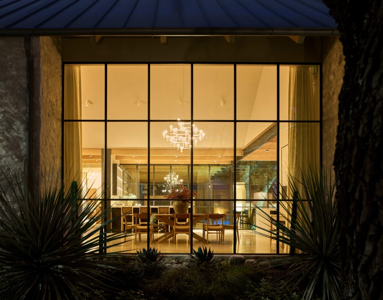 Inside A Home Where Limestone, Wood, and Steel Create Modern Warmth