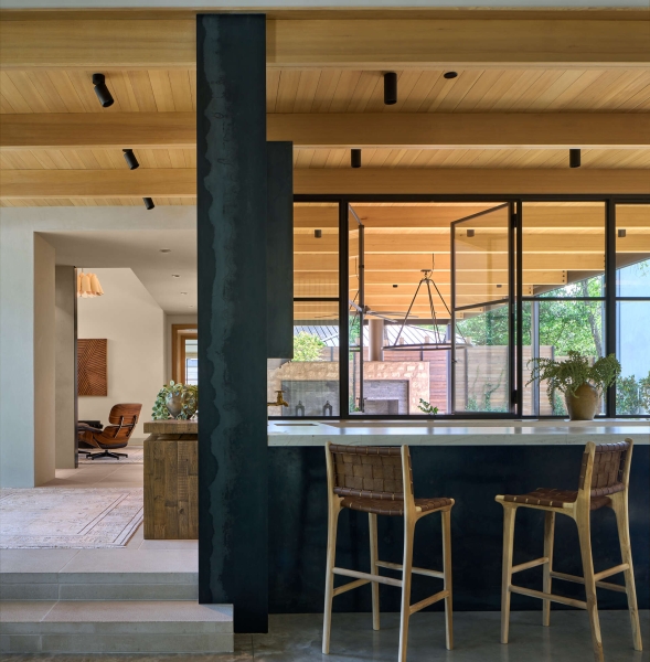Inside A Home Where Limestone, Wood, and Steel Create Modern Warmth