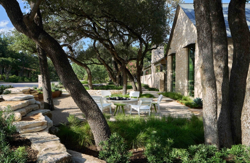 Inside A Home Where Limestone, Wood, and Steel Create Modern Warmth