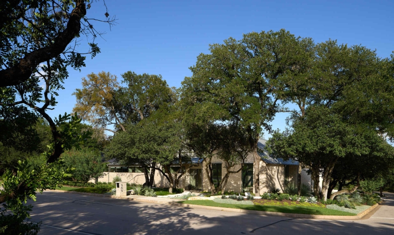 Inside A Home Where Limestone, Wood, and Steel Create Modern Warmth