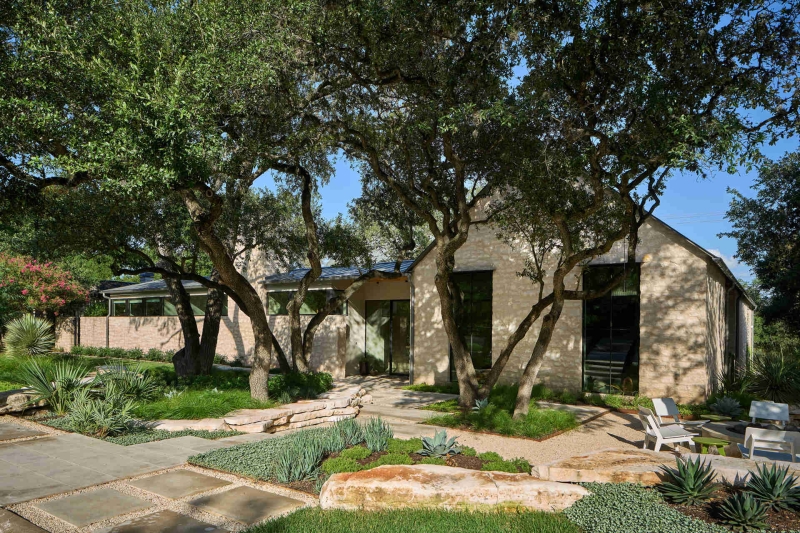 Inside A Home Where Limestone, Wood, and Steel Create Modern Warmth