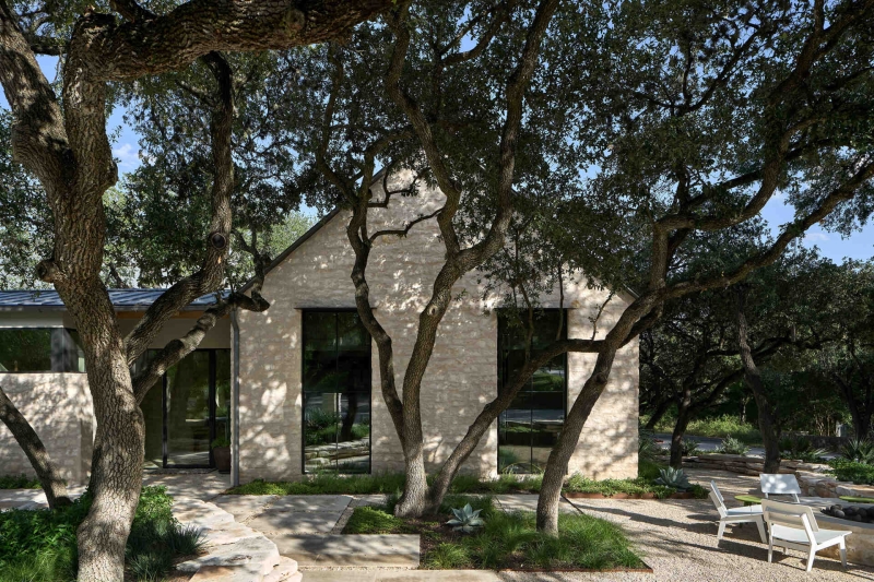 Inside A Home Where Limestone, Wood, and Steel Create Modern Warmth