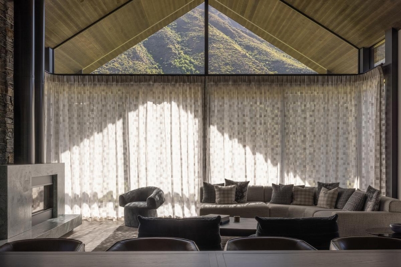 Inside a Stone-Clad Home That Frames Mountain Views