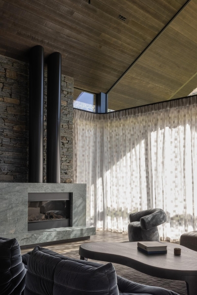 Inside a Stone-Clad Home That Frames Mountain Views