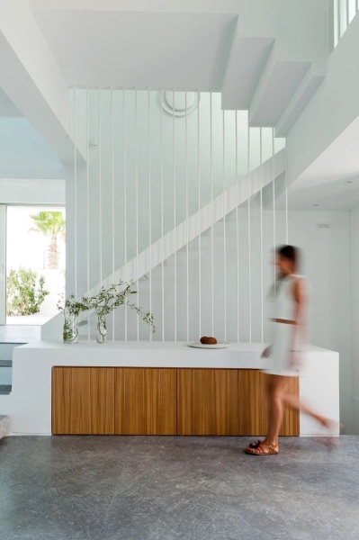 Inside the dazzling white summer home redefining island life in Santorini