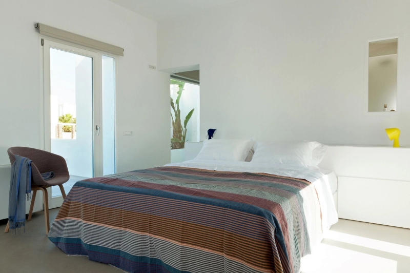 Inside the dazzling white summer home redefining island life in Santorini